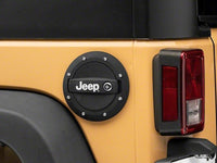 Thumbnail for Officially Licensed Jeep 07-18 Jeep Wrangler JK Locking Fuel Door w/ Printed Jeep Logo