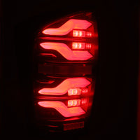 Thumbnail for AlphaRex 16-21 Toyota Tacoma LUXX LED Taillights Blk/Red w/Activ Light/Seq Signal
