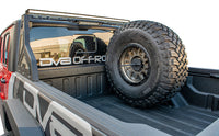Thumbnail for DV8 Offroad 2019+ Jeep Gladiator Universal Stand Up In-Bed Tire Carrier