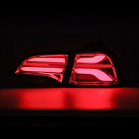 Thumbnail for AlphaRex 17-22 Tesla Model 3 PRO-Series LED Tail Lights Red Smoke w/Seq Sig