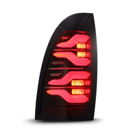 Thumbnail for AlphaRex 05-15 Toyota Tacoma LUXX LED Taillights Blk/Red w/Activ Light/Seq Signal