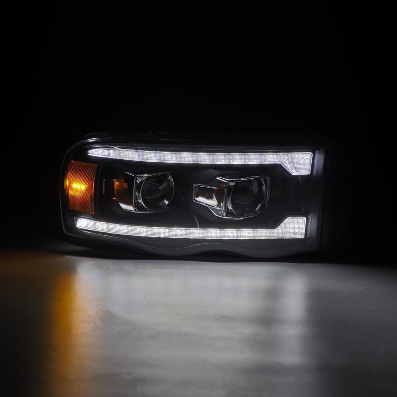 AlphaRex 02-05 Dodge Ram 1500 LUXX LED Proj Headlights Plank Style Black w/Activ Light/Seq Signal