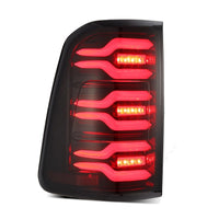 Thumbnail for AlphaRex 19-21 Dodge Ram 1500 Luxx-Series LED Tail Lights Black/Red w/Activ Light/Seq Signal