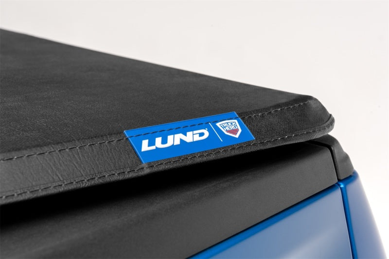 Lund 04-17 Nissan Titan (5.5ft. Bed w/Titan Box) Genesis Tri-Fold Tonneau Cover - Black