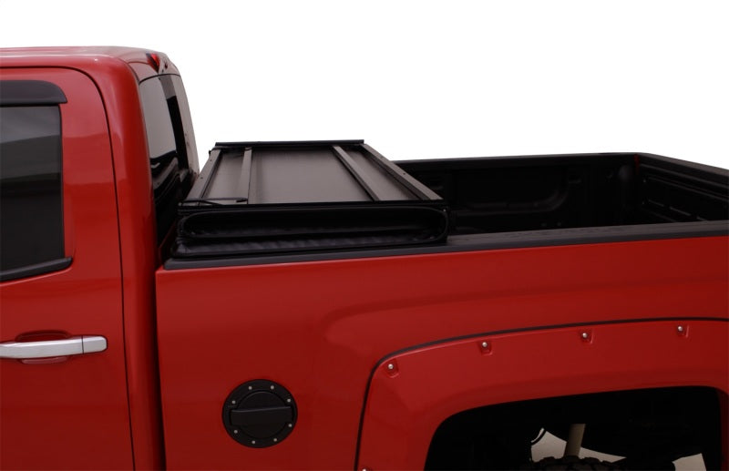 Lund 15-18 Ford F-150 Styleside (5.5ft. Bed) Hard Fold Tonneau Cover - Black