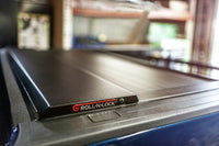 Thumbnail for Roll-N-Lock 15-17 Chevy Silverado/Sierra 2500/3500 77-3/8in E-Series Retractable Tonneau Cover