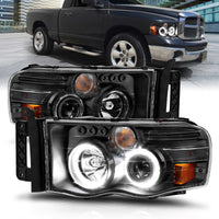 Thumbnail for ANZO 2002-2005 Dodge Ram 1500 Projector Headlights w/ Halo Black Clear Amber