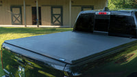 Thumbnail for Lund 15-18 Ford F-150 (5.5ft. Bed) Genesis Tri-Fold Tonneau Cover - Black