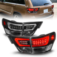 Thumbnail for ANZO 11-13 Jeep Grand Cherokee LED Taillights w/ Lightbar Black Housing/Clear Lens 4pcs