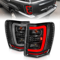 Thumbnail for ANZO 1999-2004 Jeep Grand Cherokee LED Tail Lights w/ Light Bar Black Housing Clear Lens