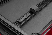 Thumbnail for Lund 05-10 Dodge Dakota Fleetside (6.5ft. Bed) Hard Fold Tonneau Cover - Black