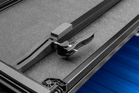 Thumbnail for Lund 16-23 Toyota Tacoma (5ft. Bed) Hard Fold Tonneau Cover - Black