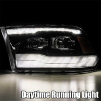Thumbnail for AlphaRex 09-18 Ram 1500HD LUXX Proj Headlight Plnk Style Jet Blk w/Activ Light/Seq Signal/Smoked DRL