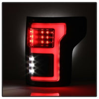 Thumbnail for Spyder 15-18 Ford F-150 Light Bar LED Tail Lights (w/Blind Spot) - Black (ALT-YD-FF15015BS-LBLED-BK)